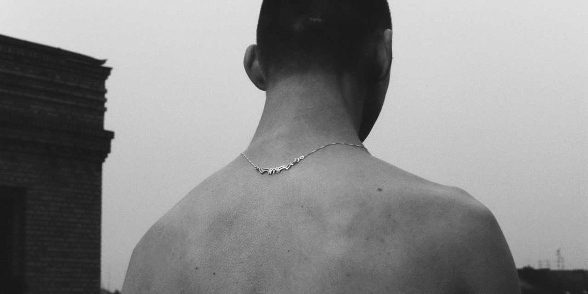 BRB Buying: Alan Crocetti’s 90s Tribal Tattoo Necklace