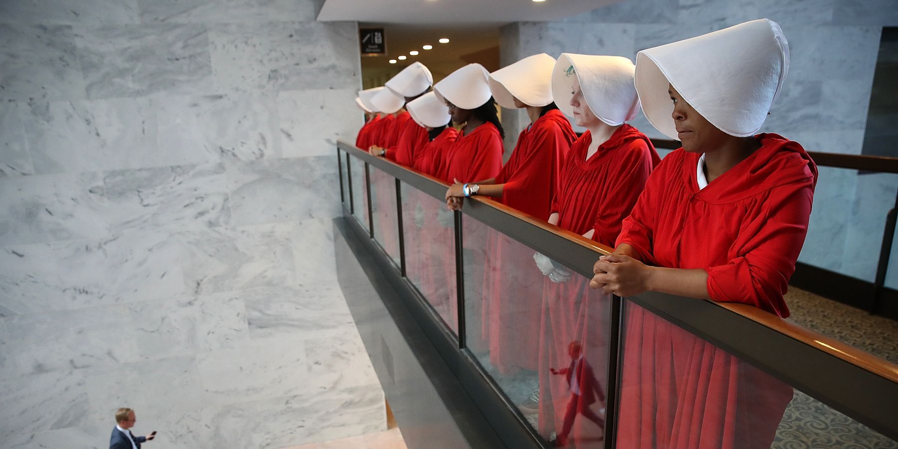 Women Show Up at Brett Kavanaugh's Hearing Dressed as Handmaids