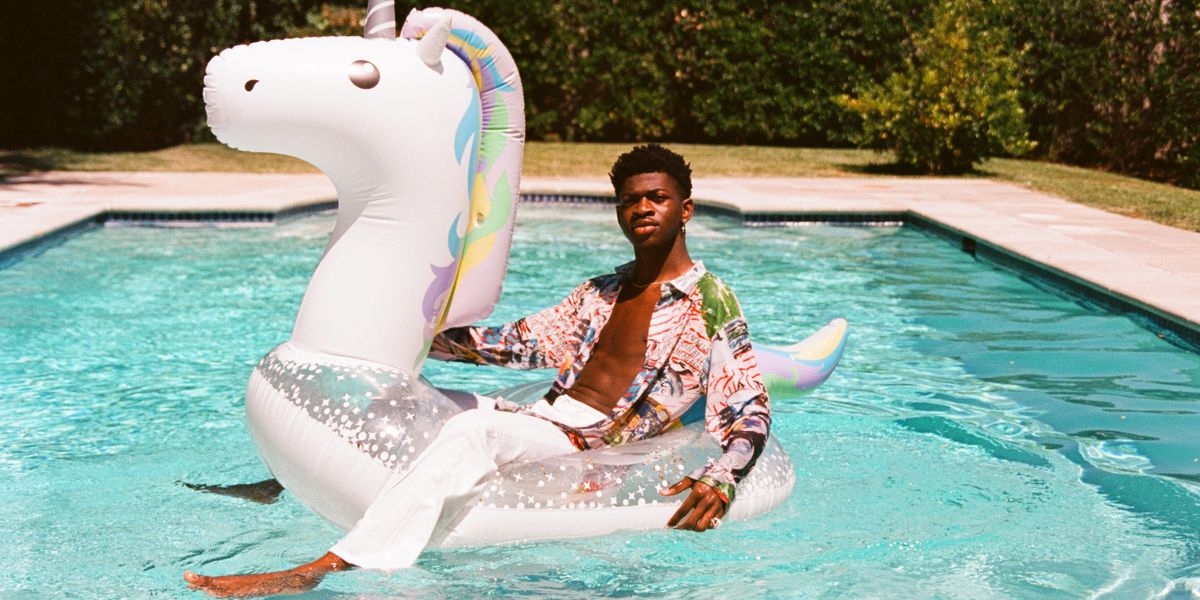 Lil Nas X on a Unicorn Floatie