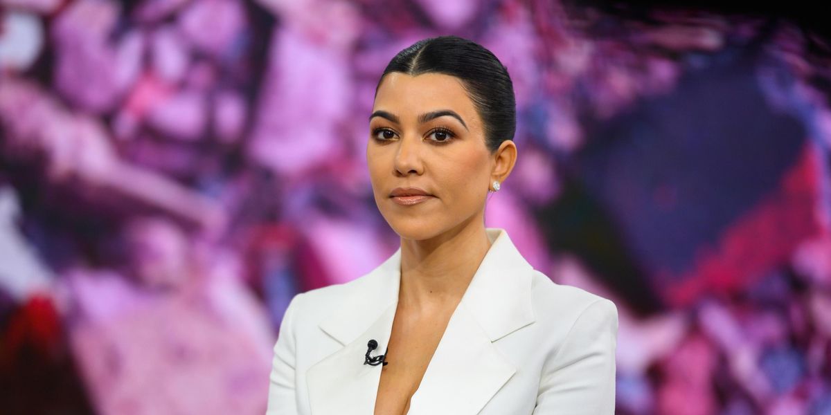 Fans Think Kourtney Kardashian Was Photoshopped Into a Family Holiday Photo