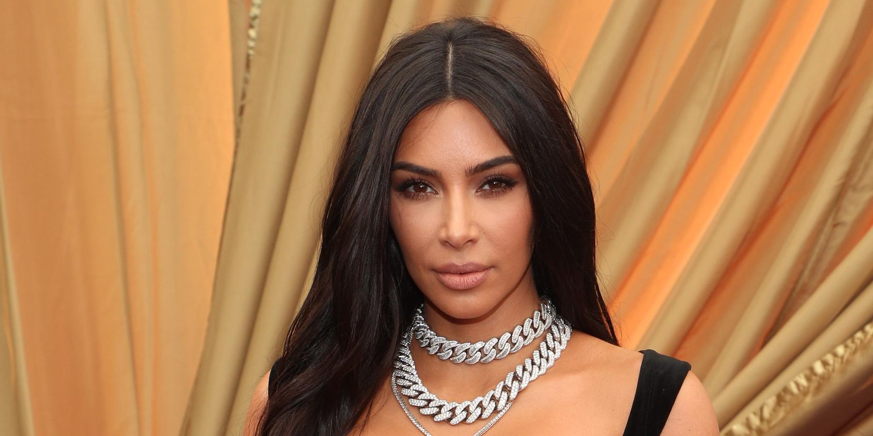 Kim Trades in Law for Paw