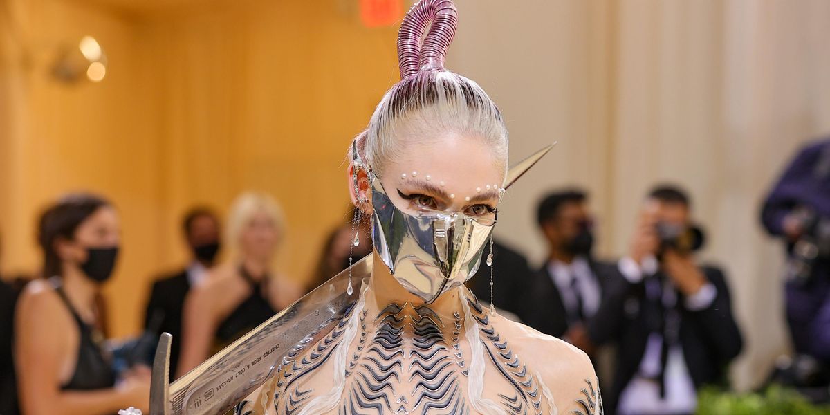 Did Grimes Shade Elon Musk Over a DIY Haircut?