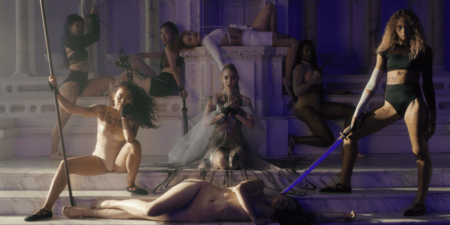 Grimes Serves Choreo With Sword Fighters in 'Violence'