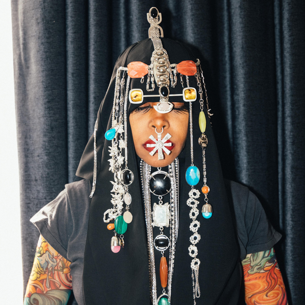 Behind Erykah Badu's CFDA CHRISHABANA Headpiece