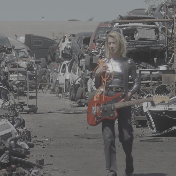 Kim Gordon Shreds Her Guitar in a Junkyard