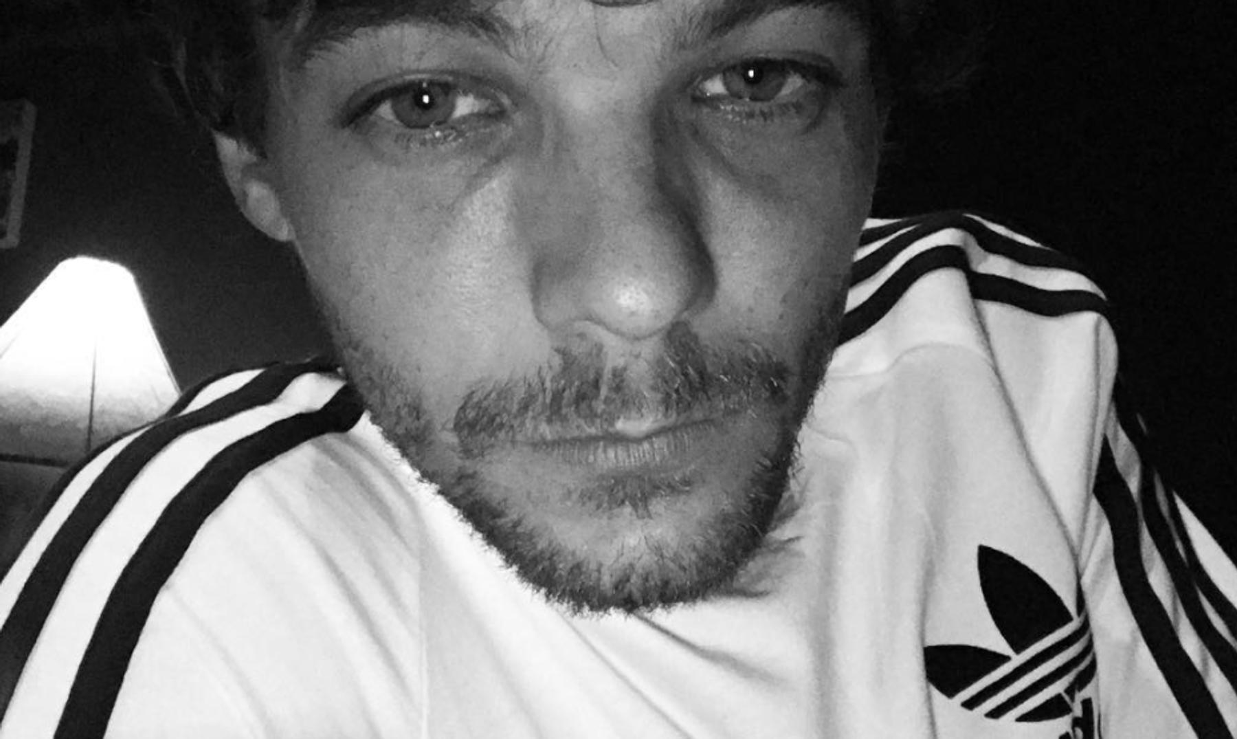 Louis Tomlinson Arrested for Attacking Member of Paparazzi