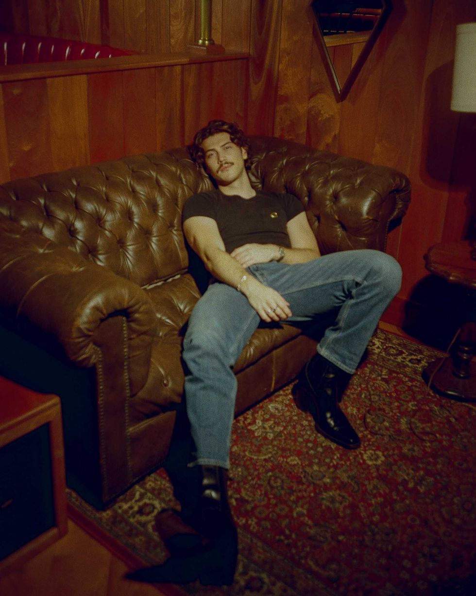 Jack Innanen in a black t-shirt and jeans.