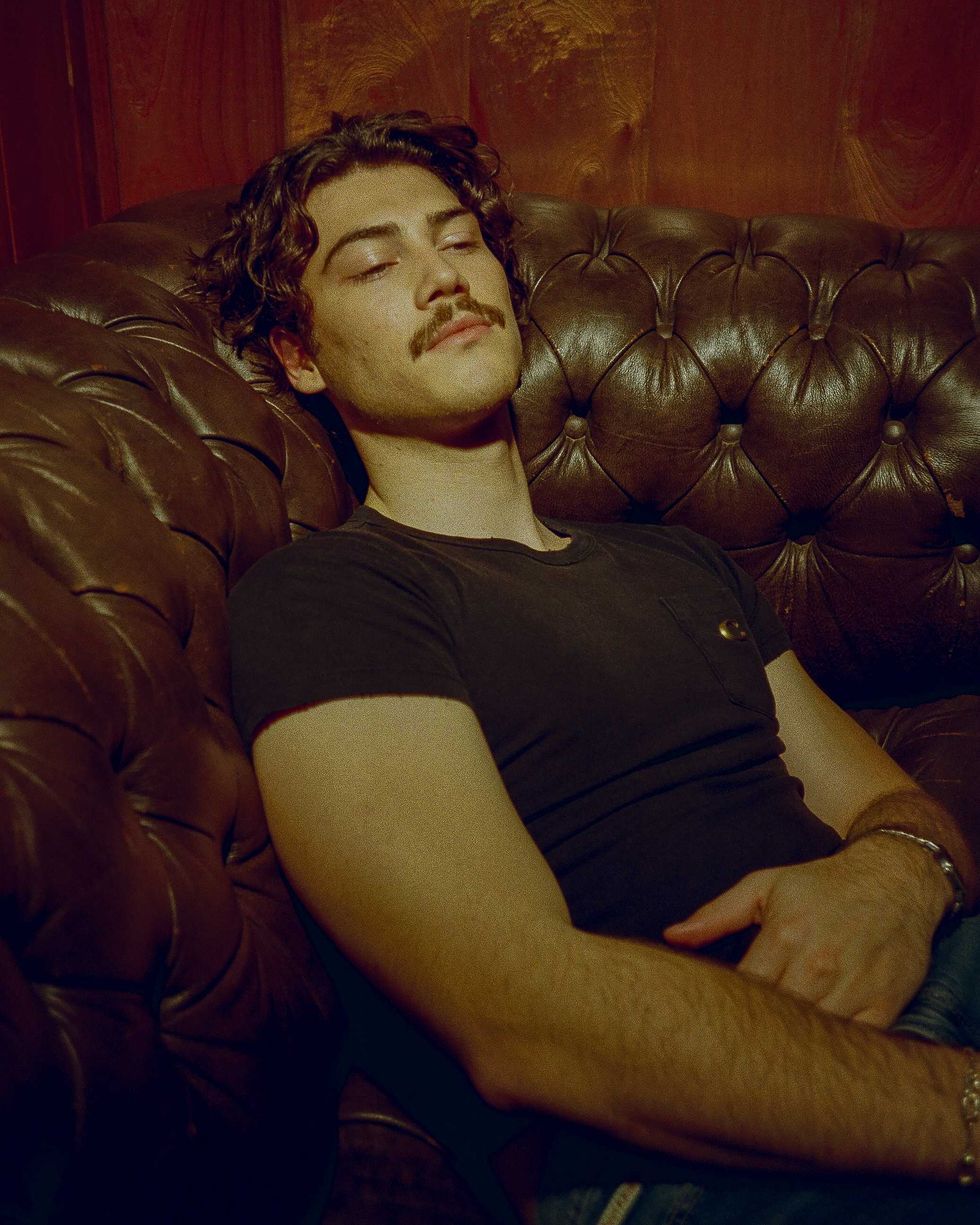 Jack Innanen in a black t-shirt and jeans.