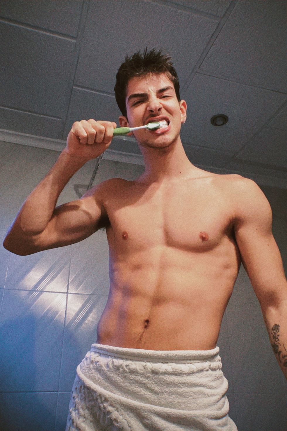 Manu Rios teeth brushing