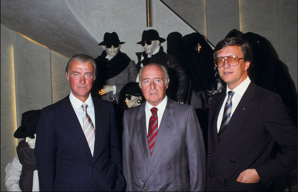 Roberto Cavalli, Maurizio and Georgio Gucci at a Gucci store in Paris, 1983